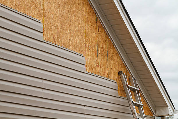 Professional Siding Replacement technician working in Forest City, PA